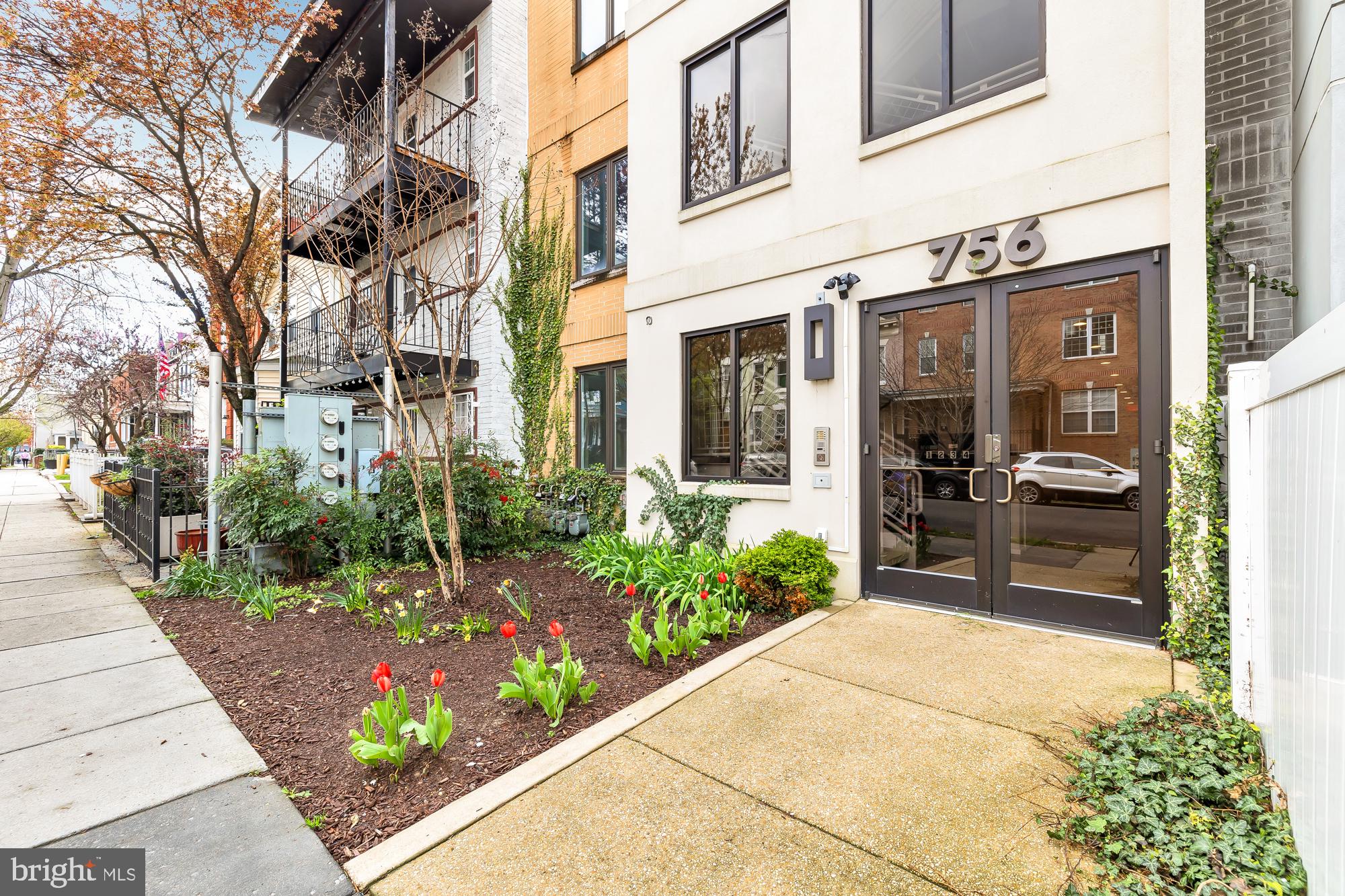 756 Park Road Northwest, Unit 1 Washington, DC 20010 - Photo 2 of 25 a view of a building with a potted plant