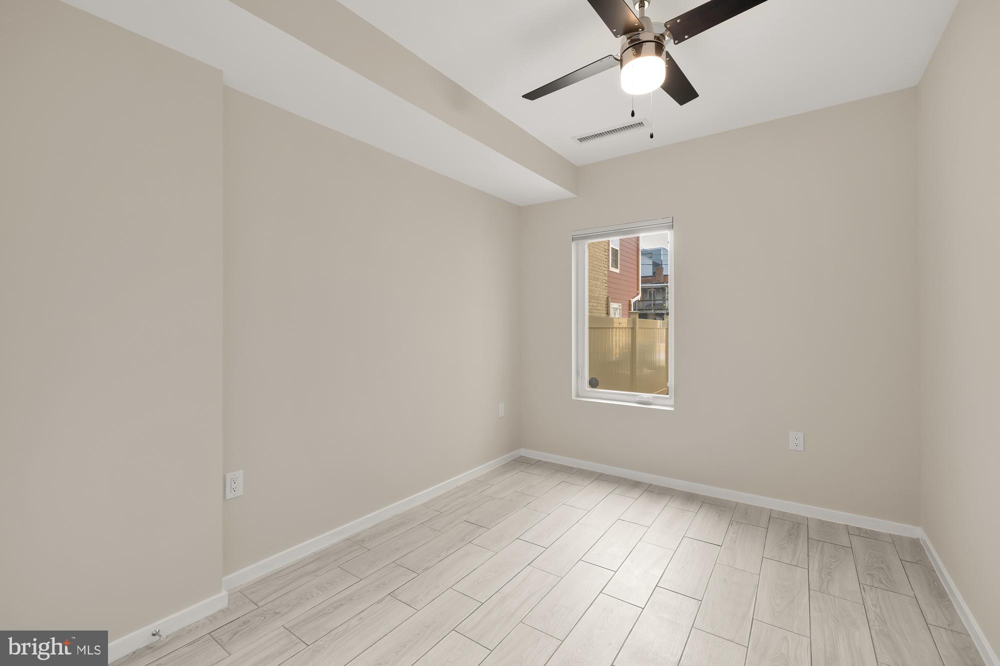 756 Park Road Northwest, Unit 1 Washington, DC 20010 - Photo 21 of 25 a view of an empty room with a window