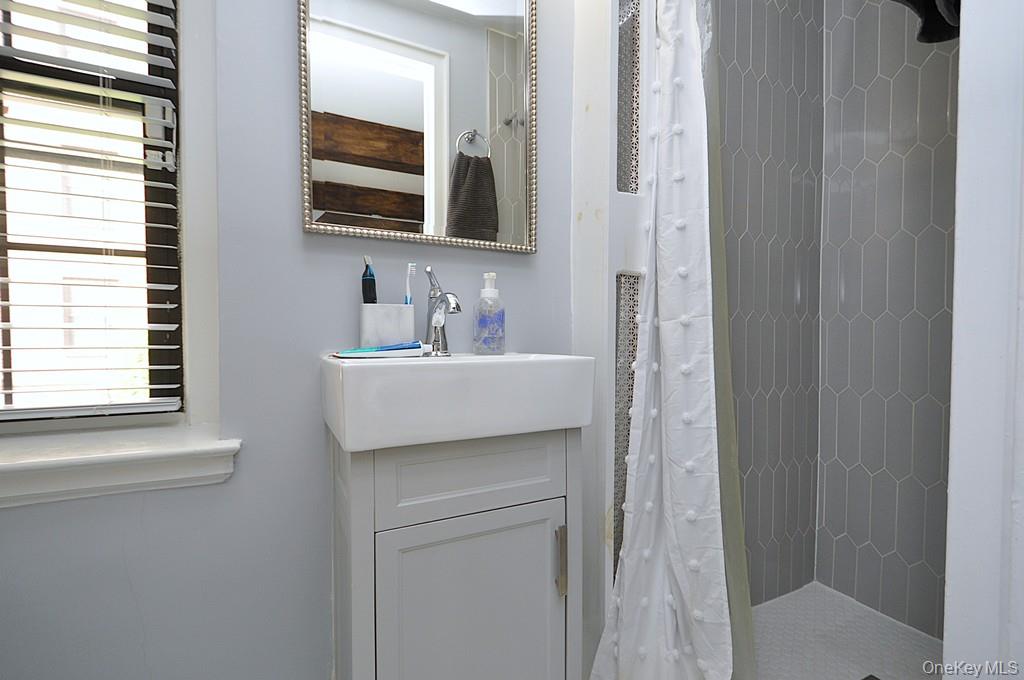 192 Garth Road, Unit TP Scarsdale, NY 10583 - Photo 24 of 43 The private bedroom wing features two spacious bedrooms and two beautifully updated bathrooms, creating a peaceful retreat from the day. Every detail has been carefully curated to deliver comfort, style, and functionality.