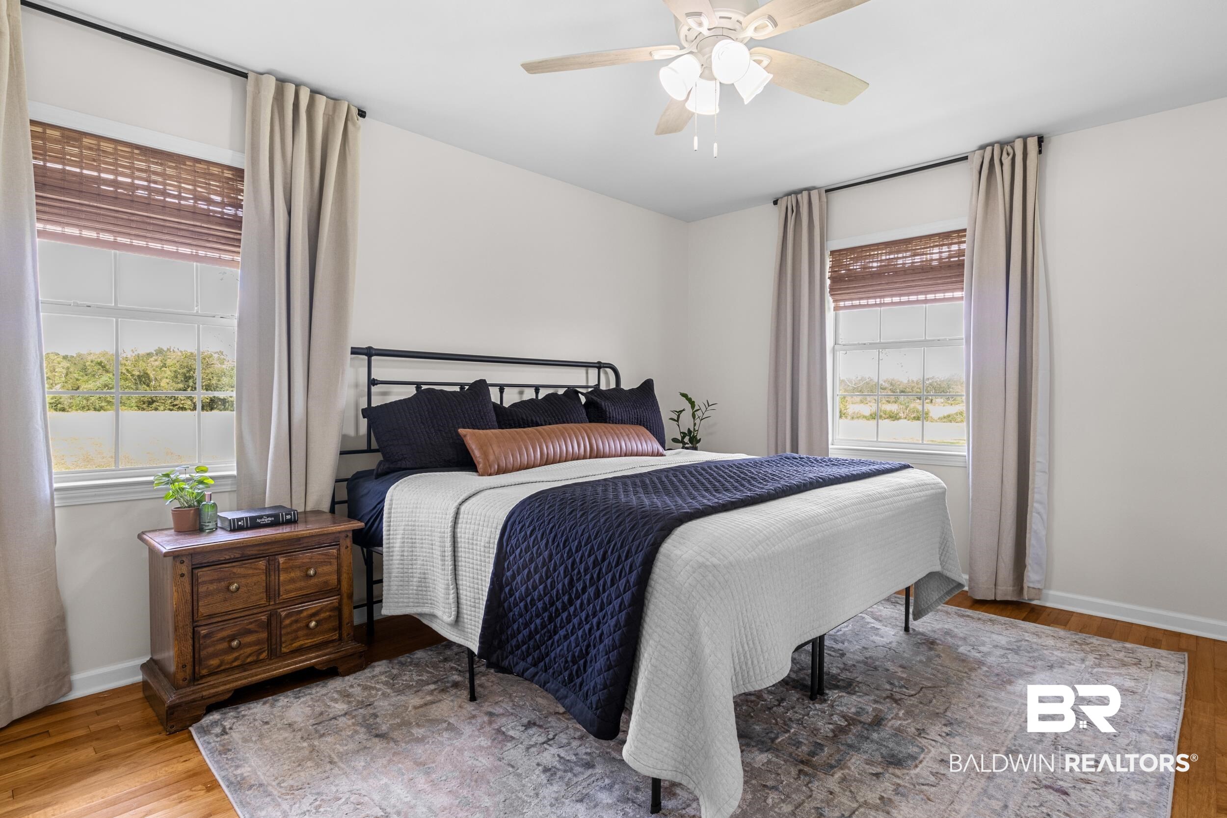 17689 Brewer Road Foley, AL 36535 - Photo 37 of 54 Bedroom featuring light hardwood / wood-style flooring, multiple windows, and ceiling fan