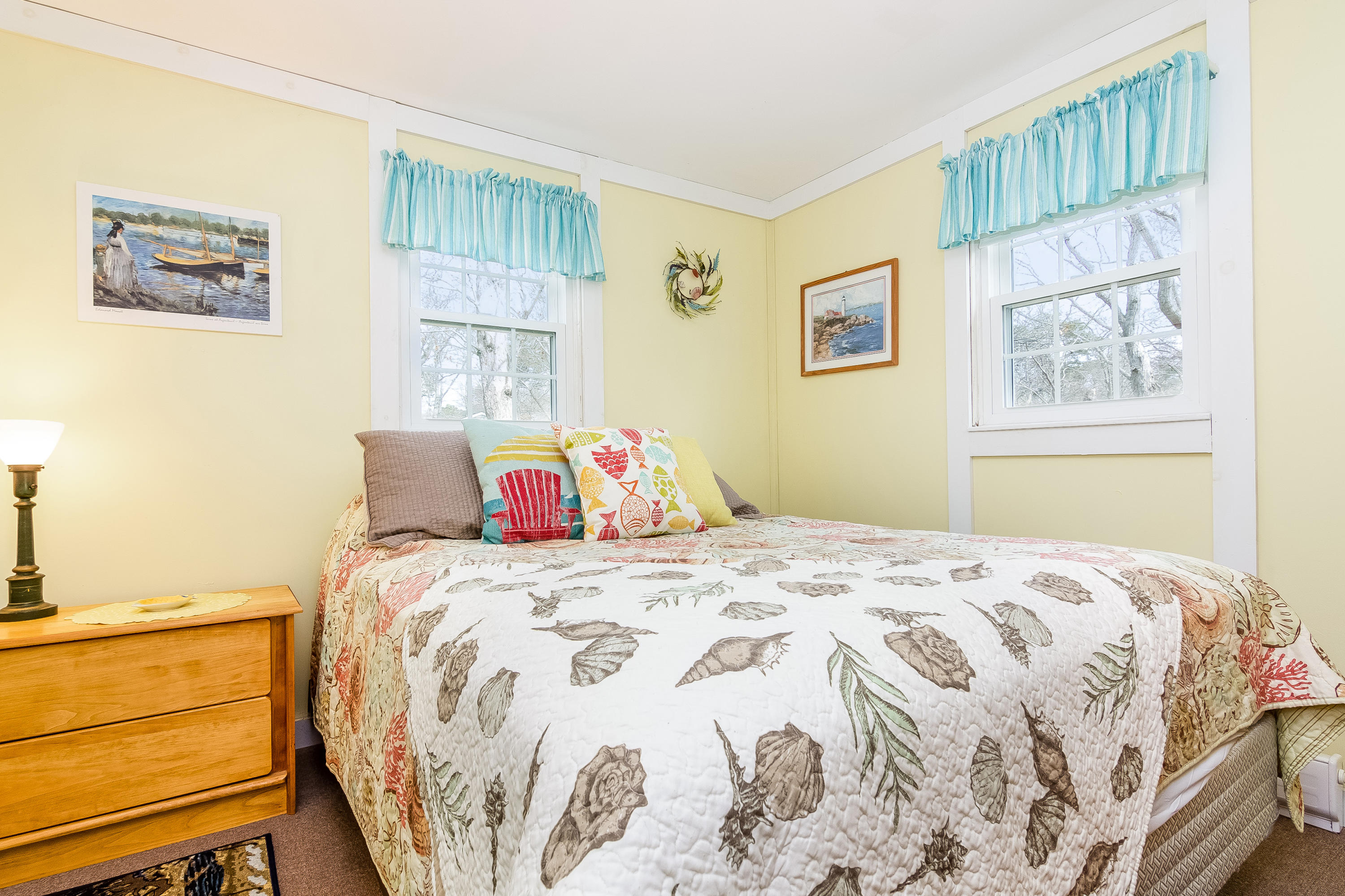 20 Hidden Lane Eastham, MA 02642 - Photo 12 of 21 a bedroom with a bed and a window