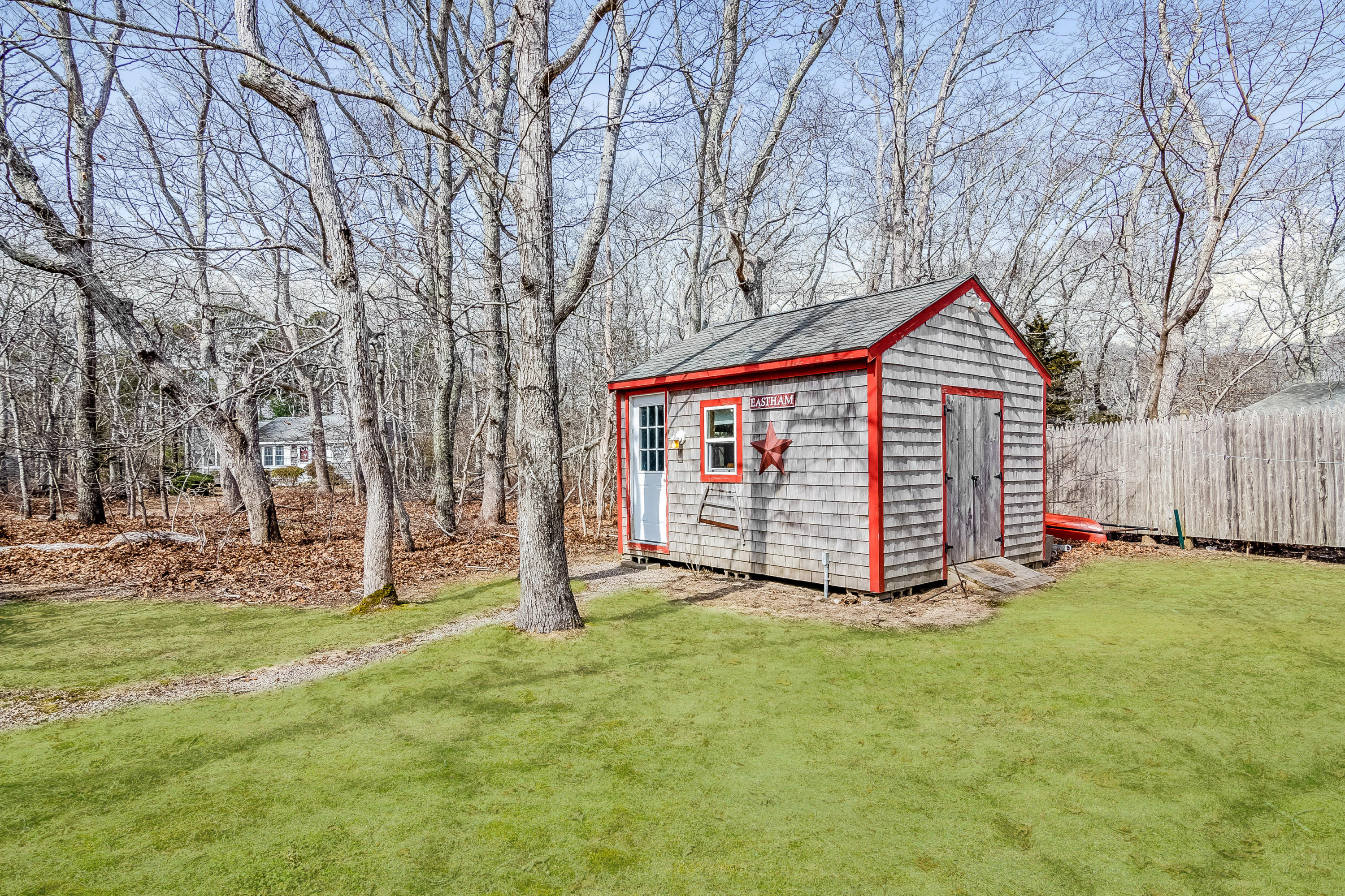 20 Hidden Lane Eastham, MA 02642 - Photo 16 of 21 a view of a house with backyard and tree