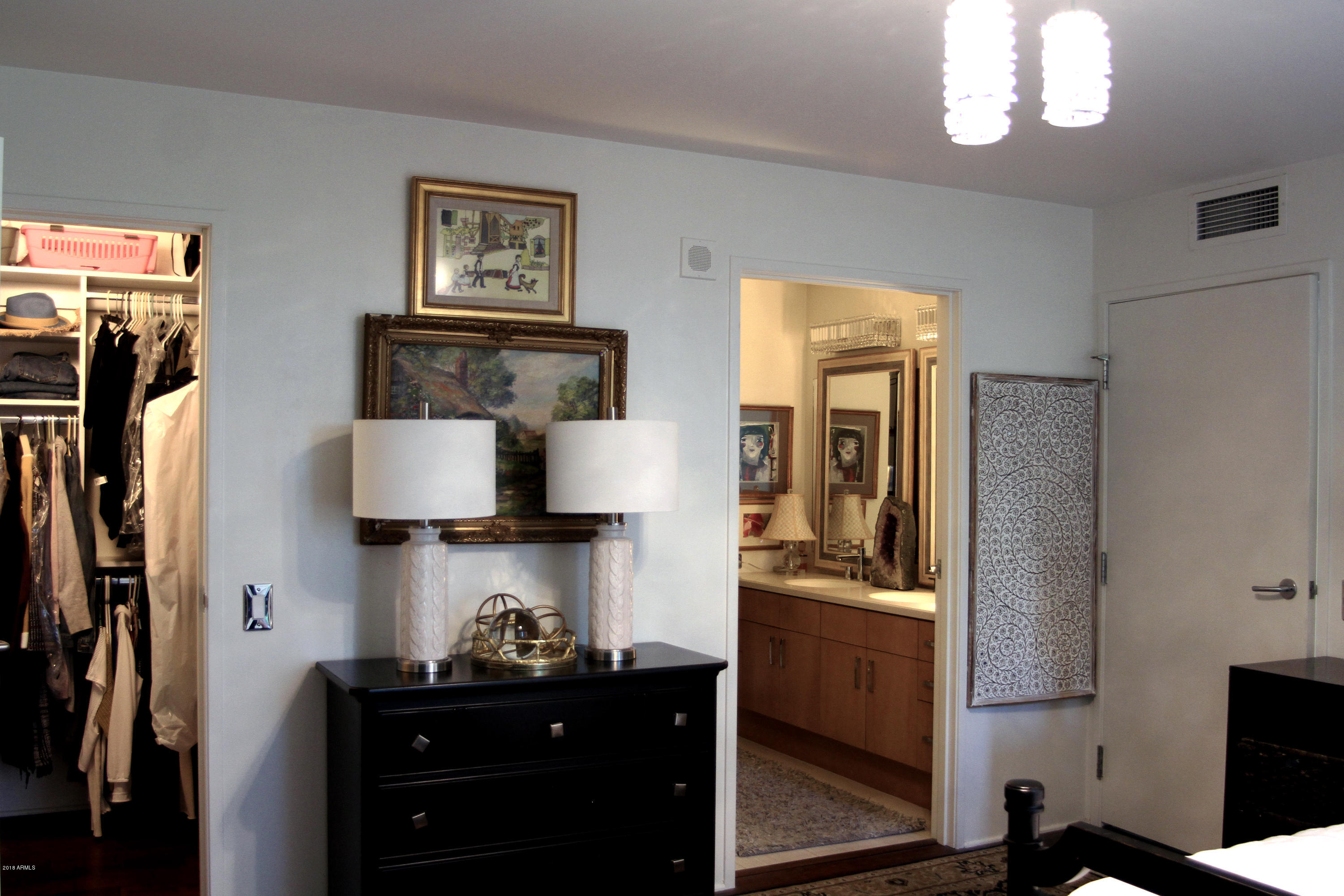 4808 North 24th Street, Unit 605 Phoenix, AZ 85016 - Photo 12 of 27 a kitchen with a refrigerator and a stove