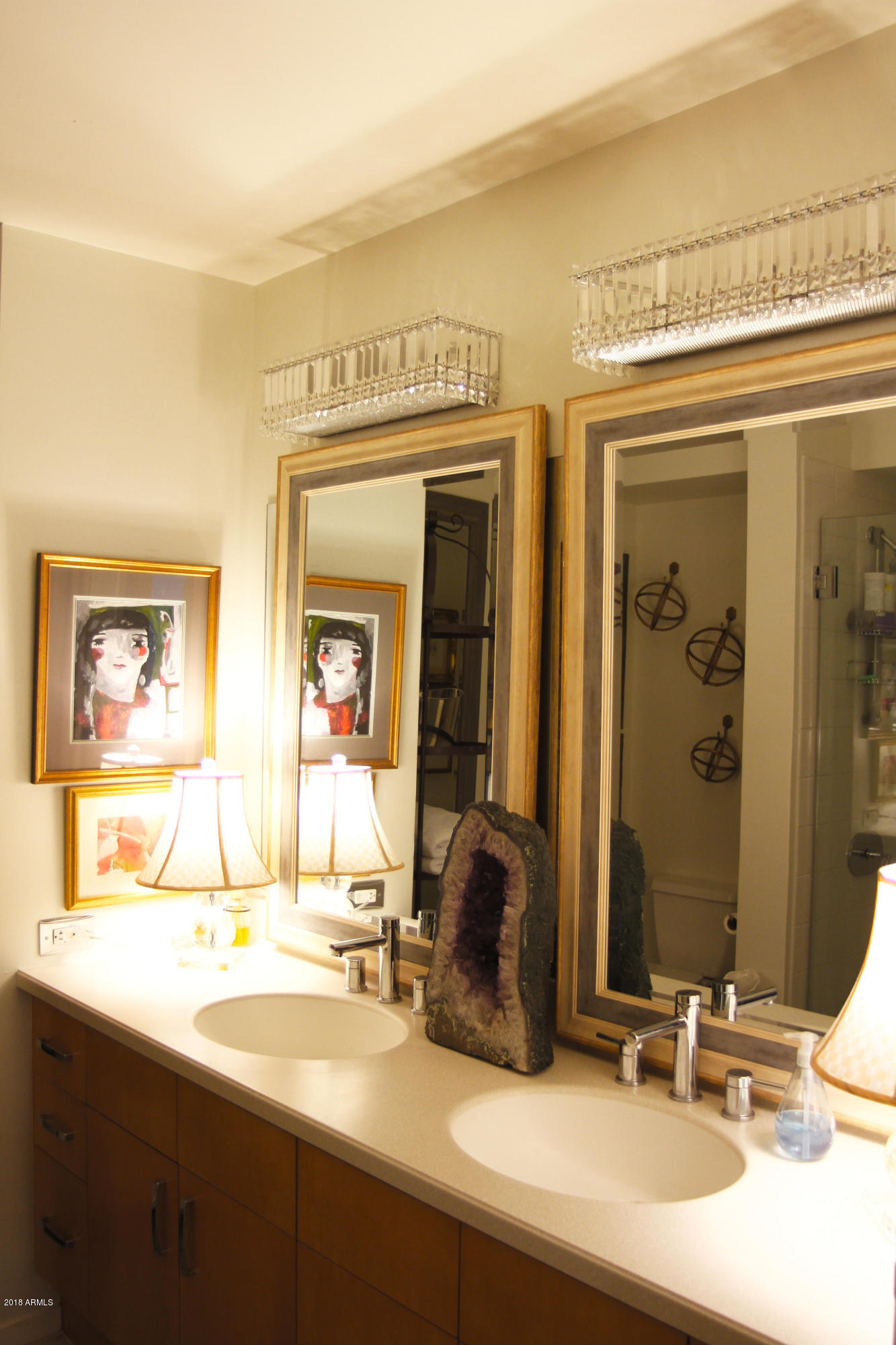 4808 North 24th Street, Unit 605 Phoenix, AZ 85016 - Photo 15 of 27 a bathroom with a sink and a mirror