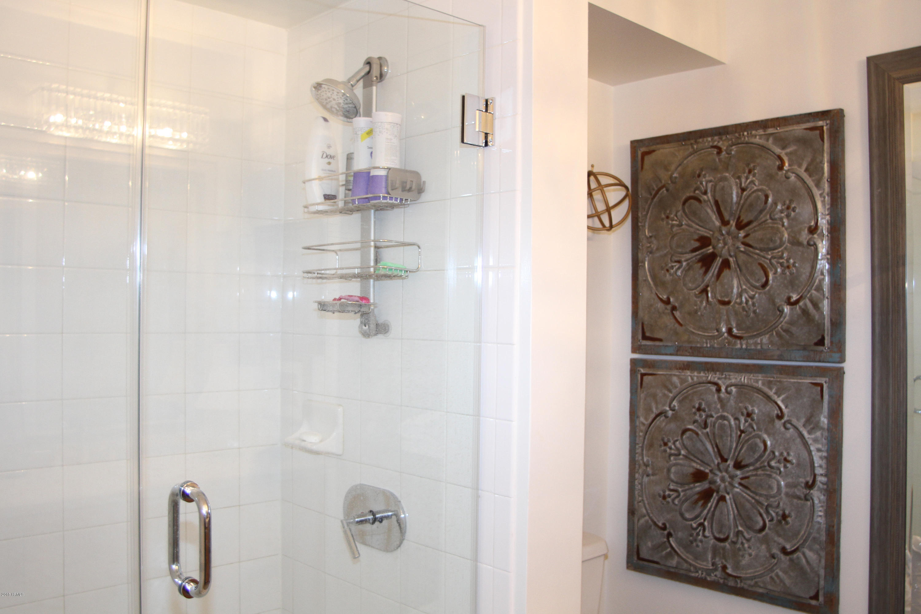 4808 North 24th Street, Unit 605 Phoenix, AZ 85016 - Photo 16 of 27 a bathroom with a shower