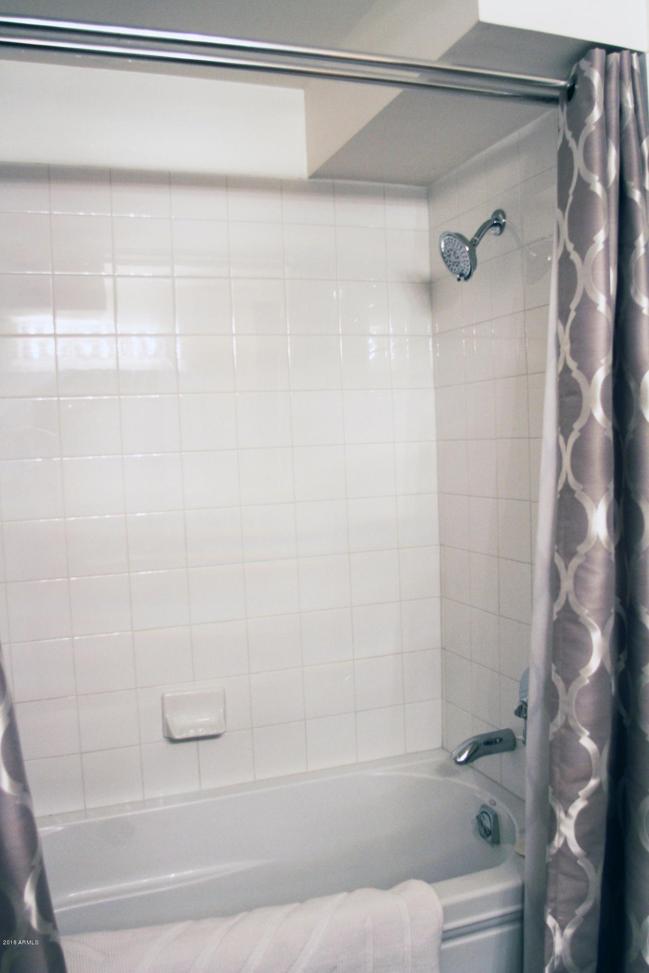 4808 North 24th Street, Unit 605 Phoenix, AZ 85016 - Photo 20 of 27 a bathroom with a shower