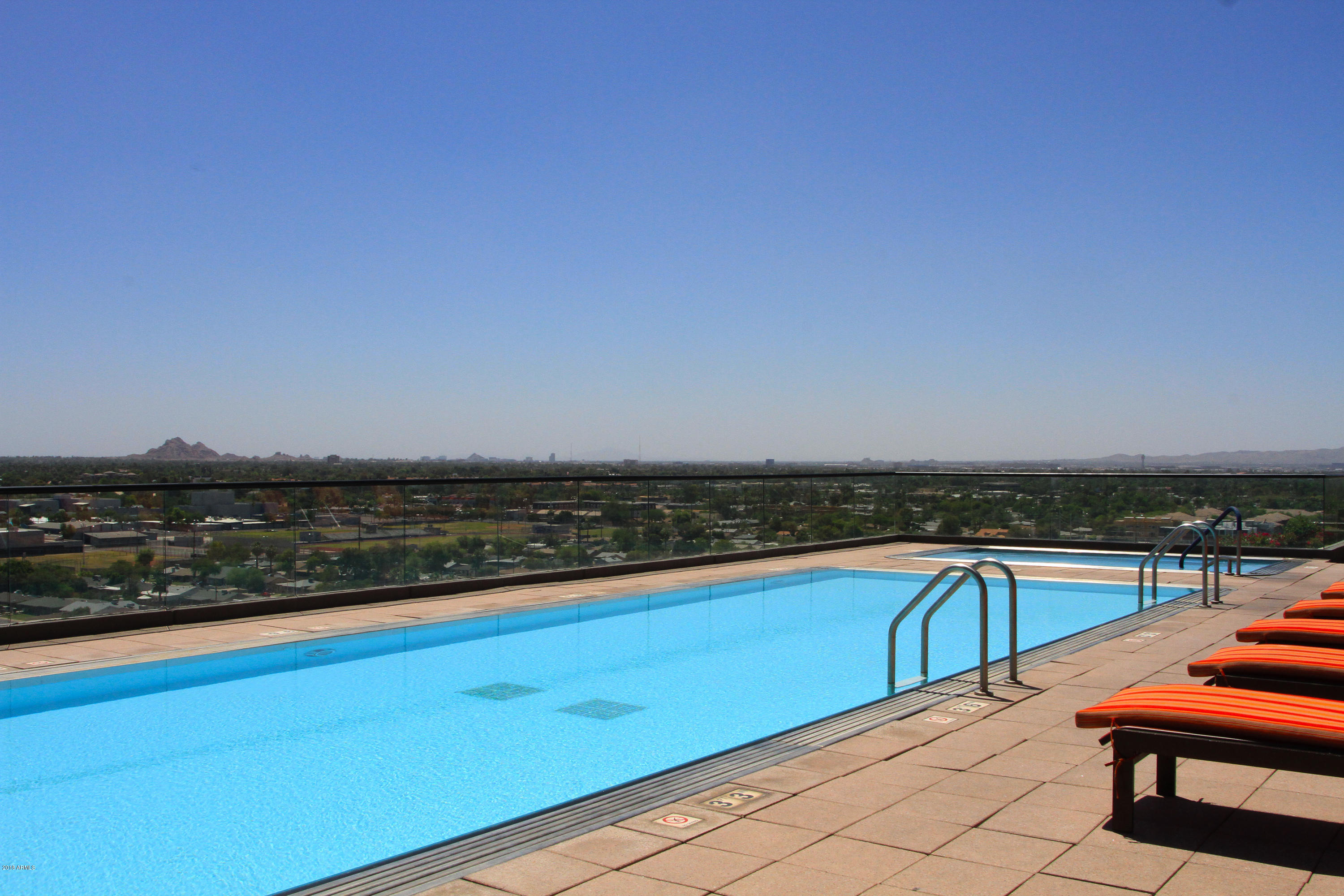 4808 North 24th Street, Unit 605 Phoenix, AZ 85016 - Photo 27 of 27 a view of a swimming pool with a terrace
