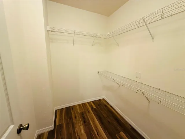 a view of a room with racks on the wall