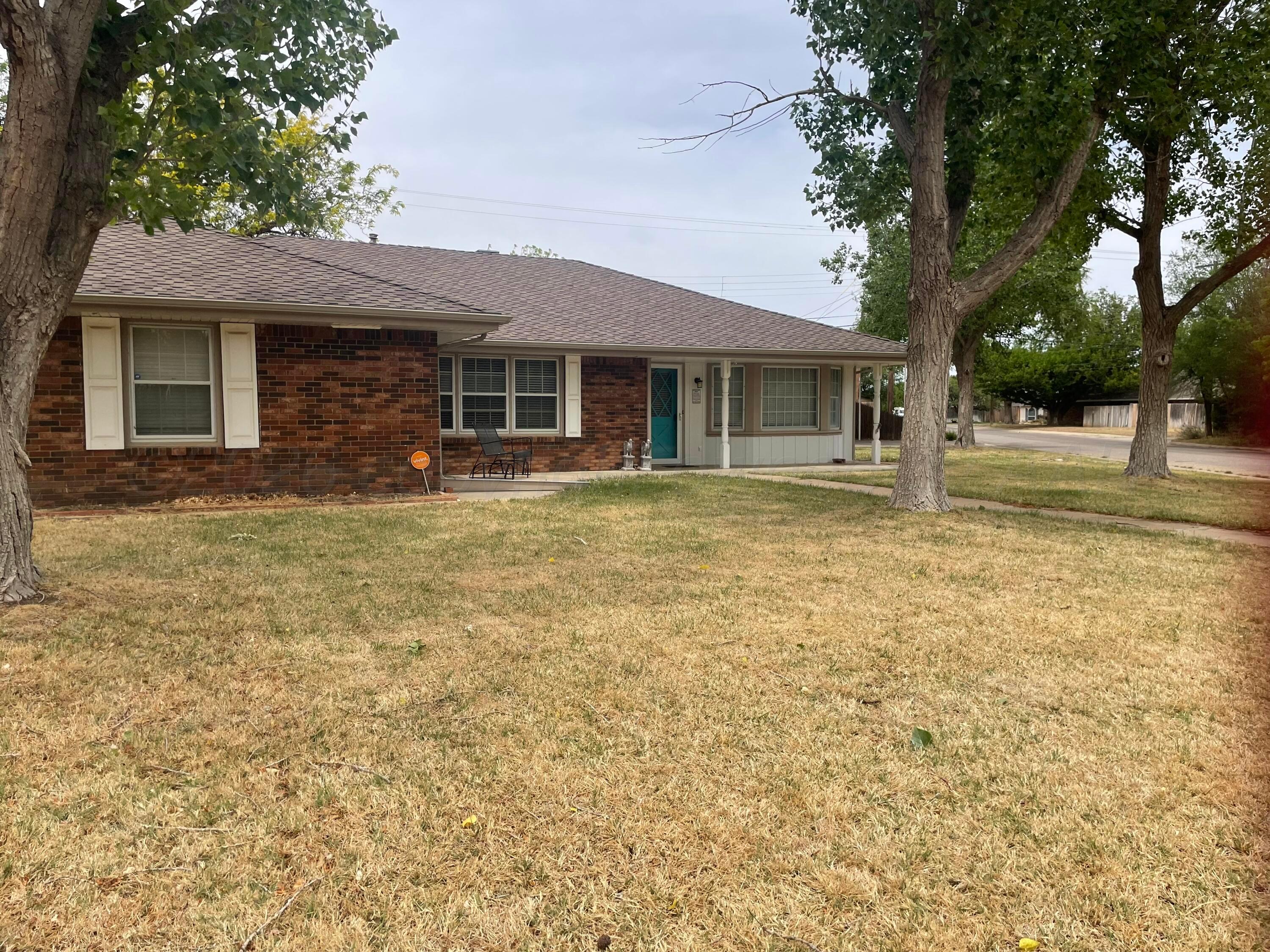 6200 Hanson Road Amarillo, TX 79106 - Photo 1 of 22 a house with swimming pool in front of it