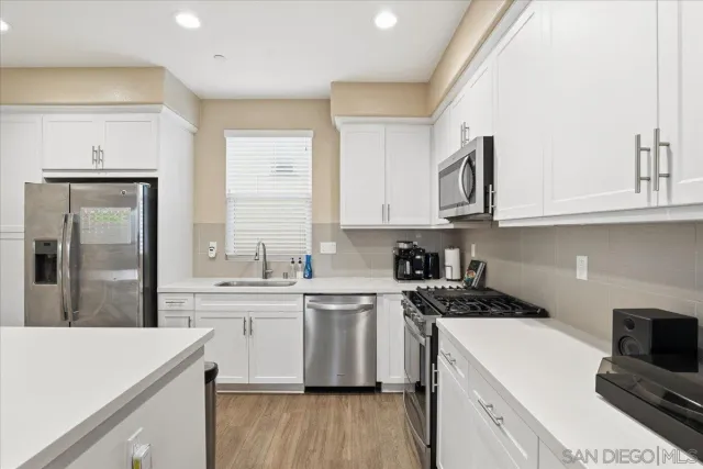 a bed room with a bed and a dresser