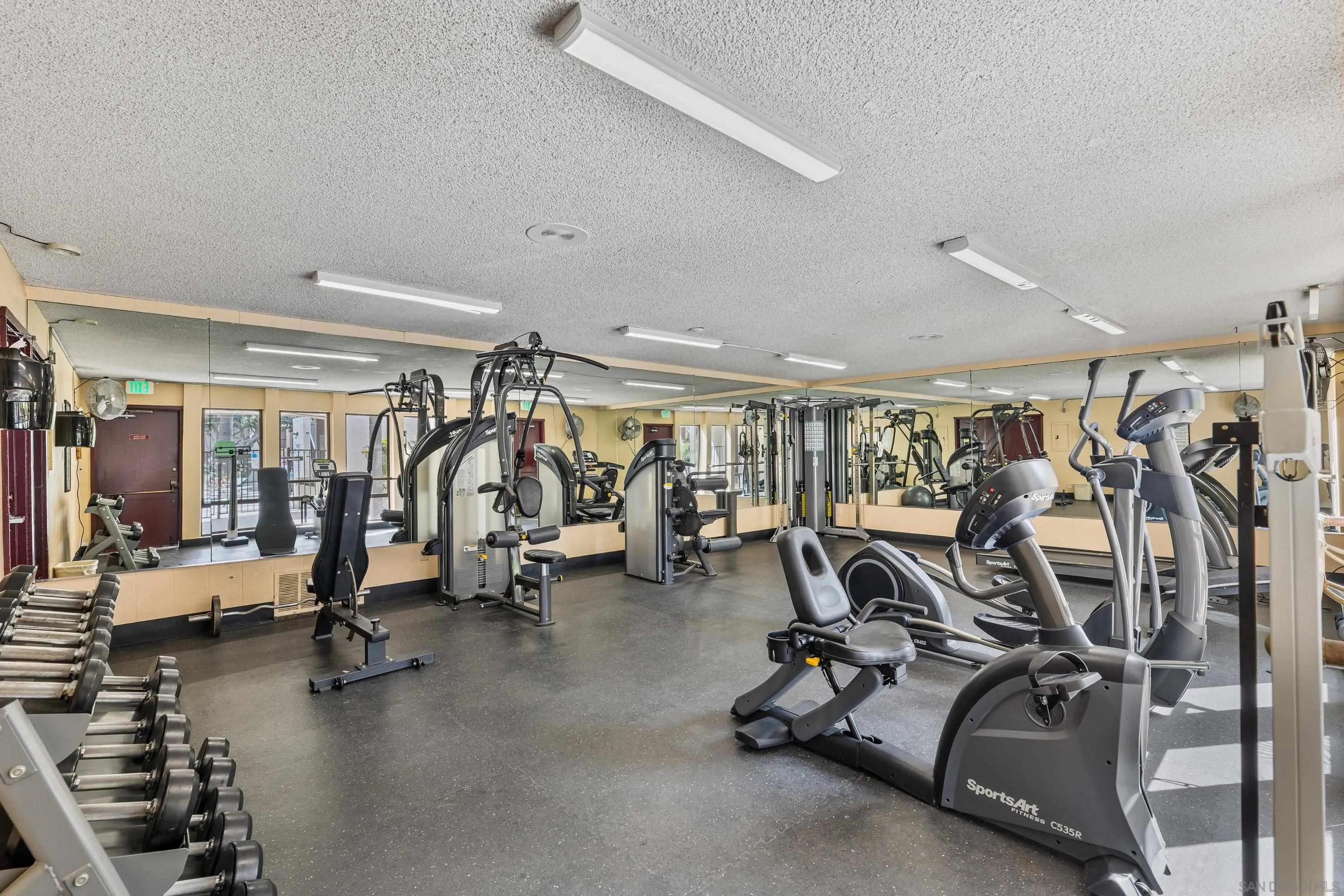 6780 Friars Road, Unit 212 San Diego, CA 92108 - Photo 21 of 25 a view of a room with gym equipment