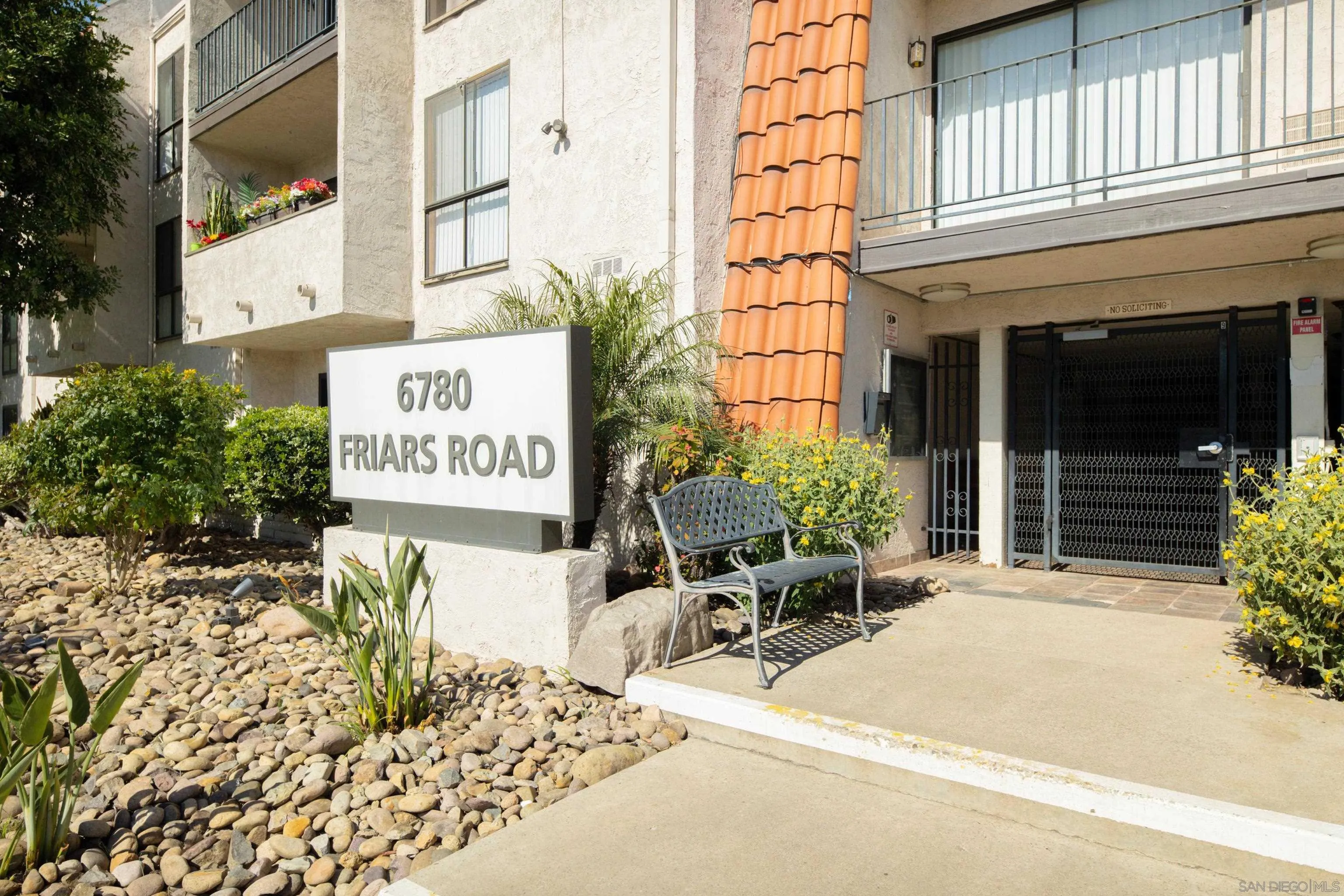6780 Friars Road, Unit 212 San Diego, CA 92108 - Photo 3 of 25 a row of table and chairs in front of building