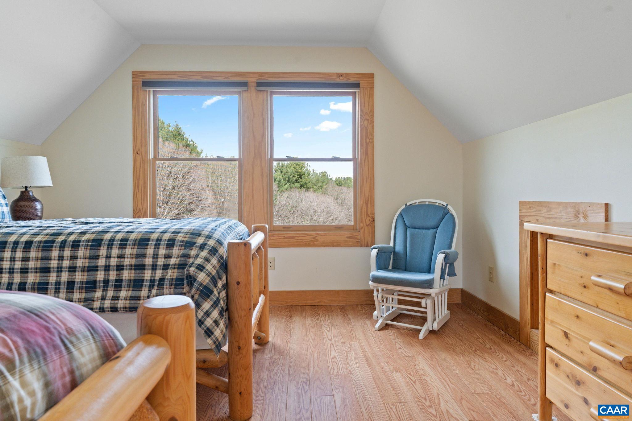 42 River Ridge Lane Stanardsville, VA 22973 - Photo 63 of 70 a bedroom with furniture and a window