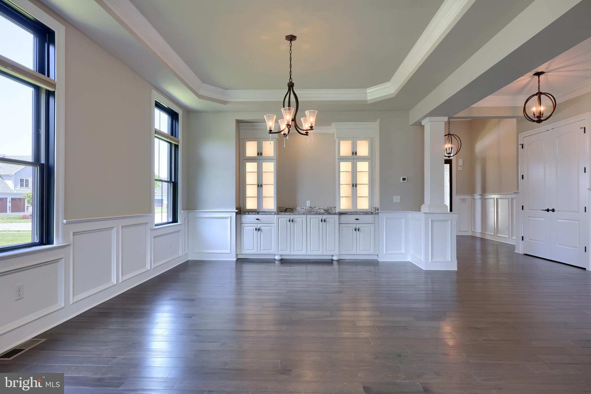 428 Southampton Drive Lititz, PA 17543 - Photo 3 of 60 a view of a hallway with wooden floor windows and chandelier