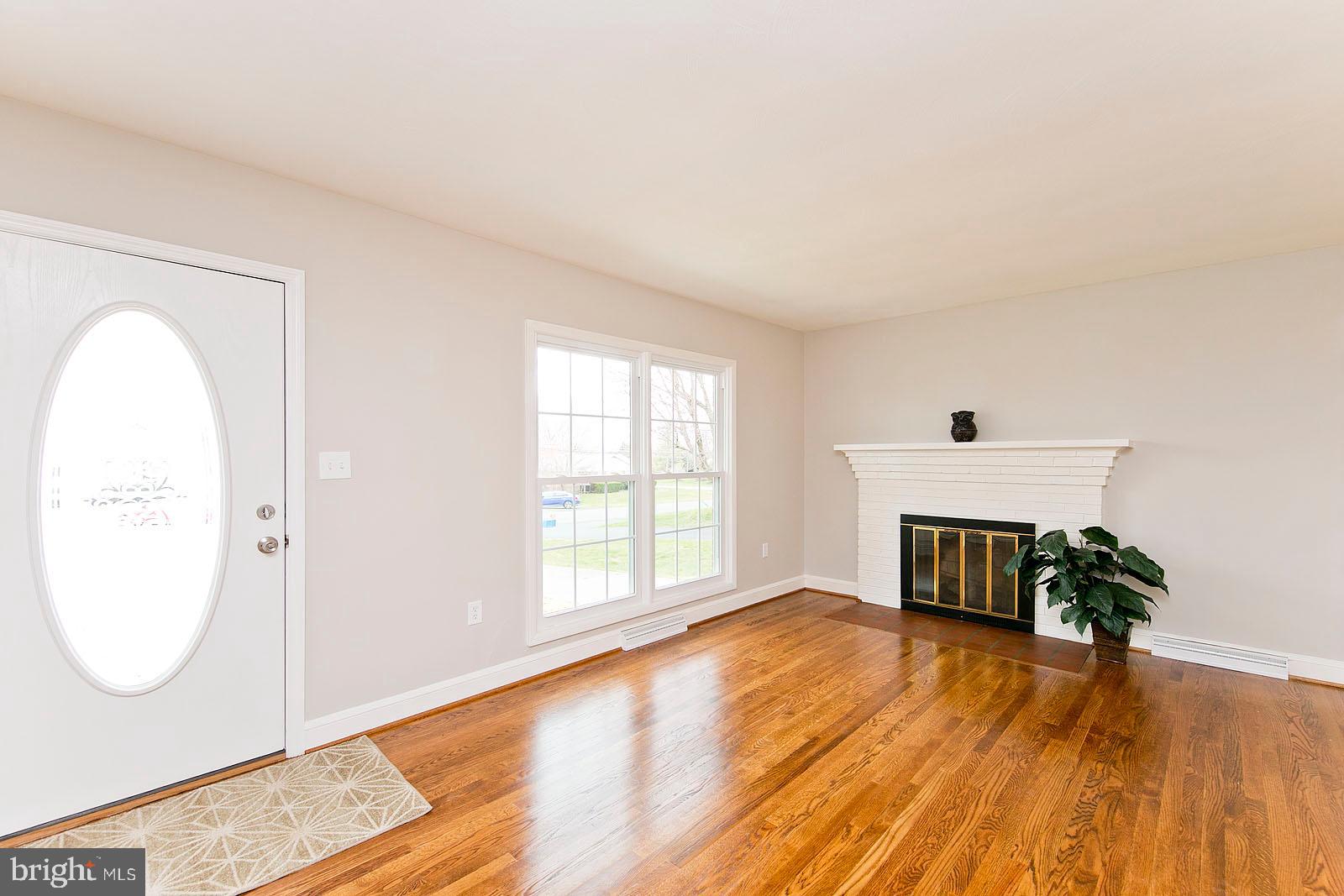 531 Applecroft Road Winchester, VA 22601 - Photo 2 of 50 Living room with wood burning fireplace