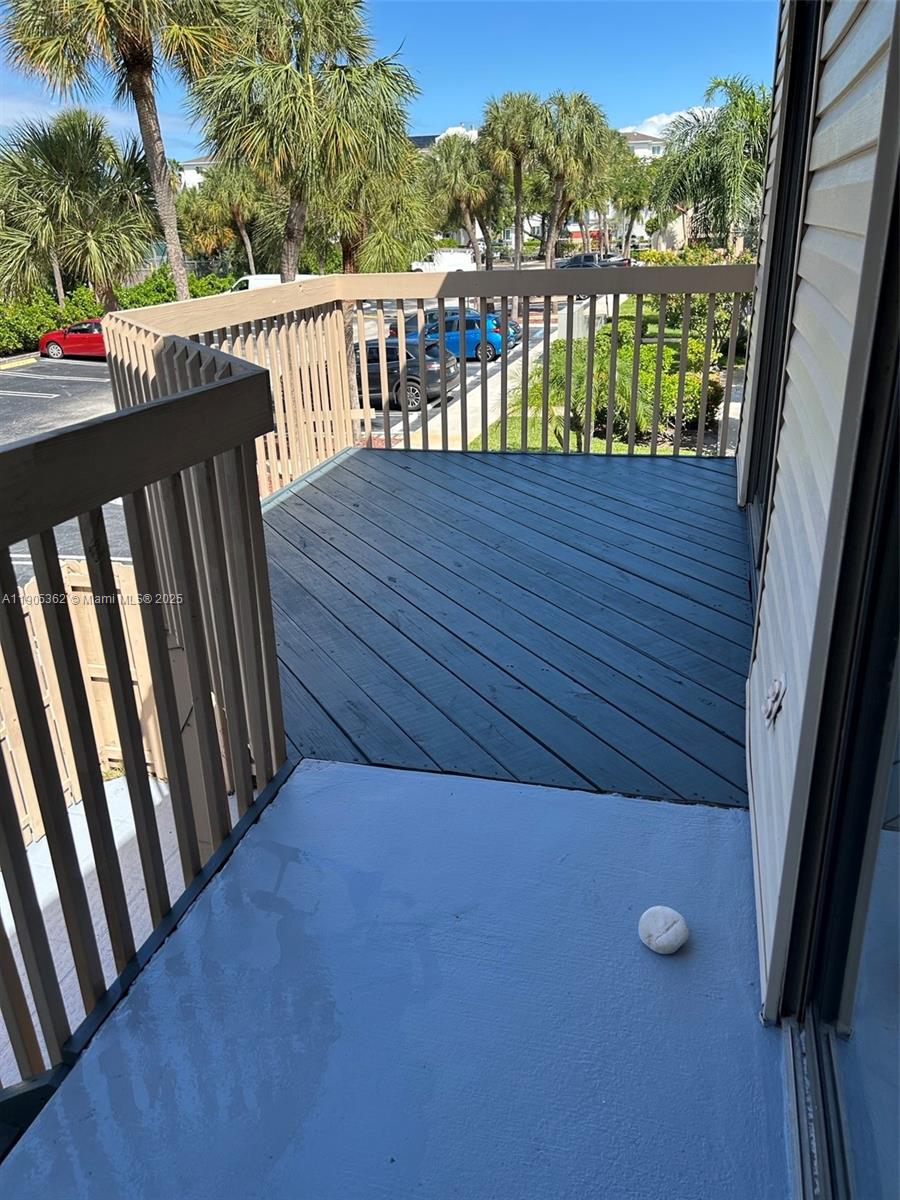 600 Executive Center Drive, Unit 204 West Palm Beach, FL 33401 - Photo 8 of 9 a view of balcony with furniture