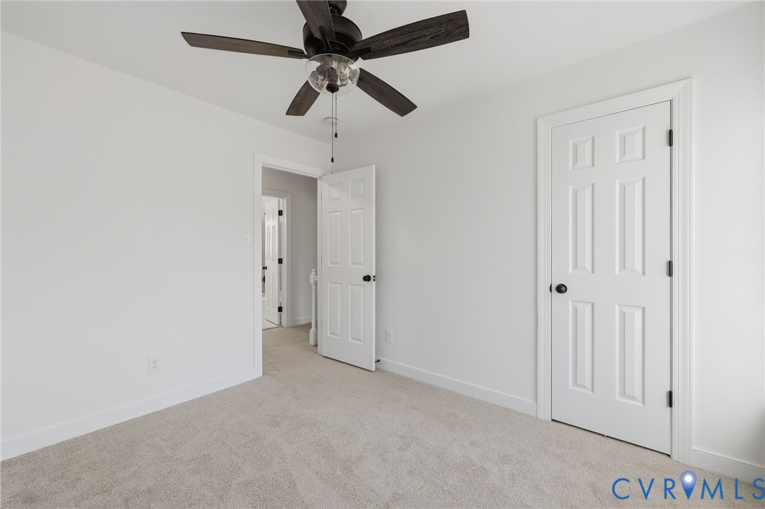 3264 Sherwood Ridge Way Powhatan, VA 23139 - Photo 29 of 40 en empty room with fan