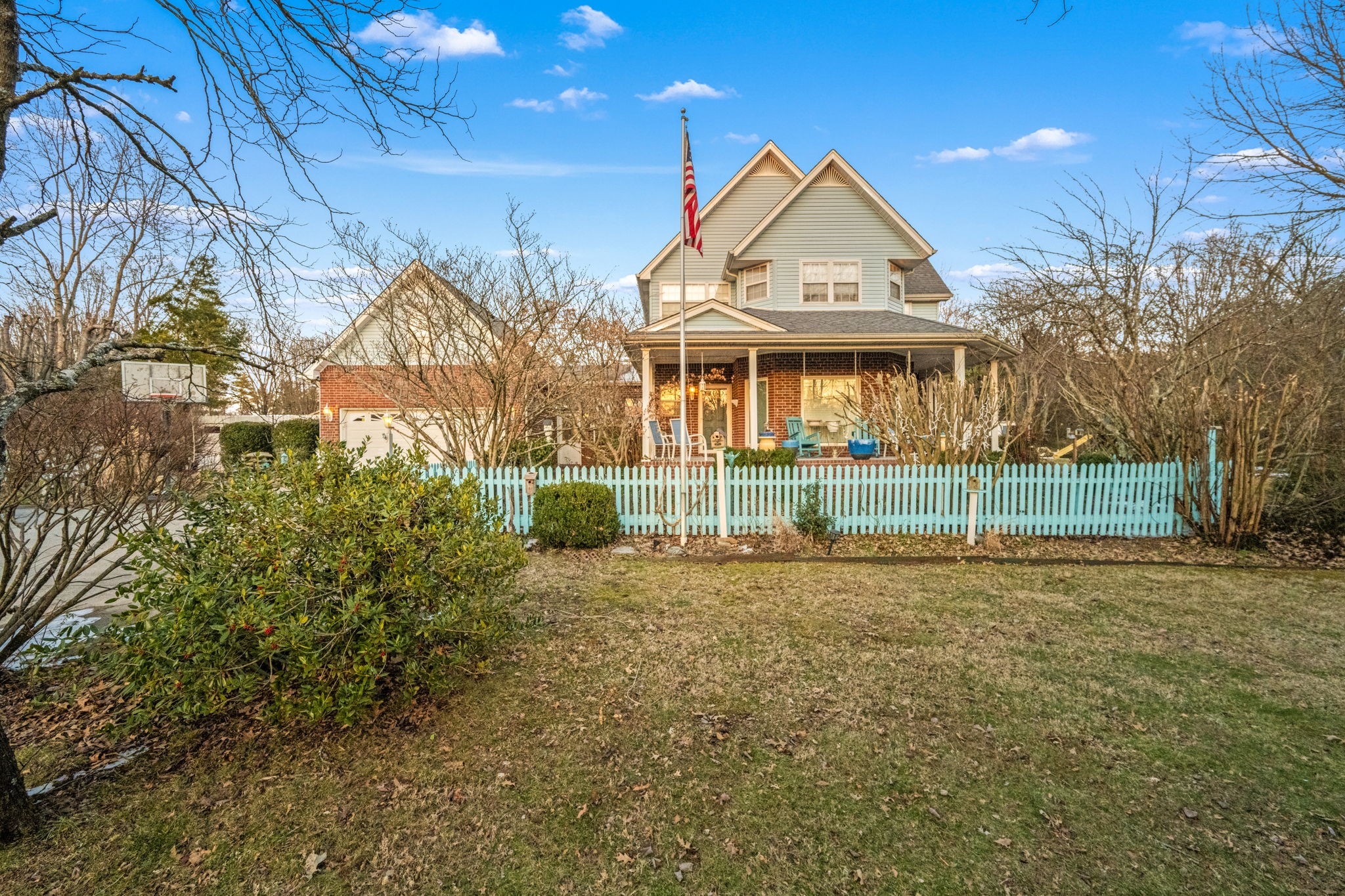 front view of a house with a yard