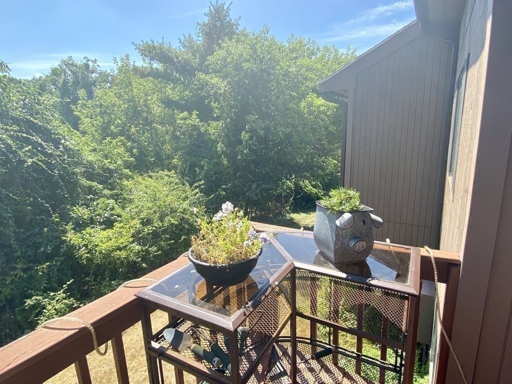 215 Trailside Way, Unit 215 Ashland, MA 01721 - Photo 7 of 15 a outdoor view with a seating space