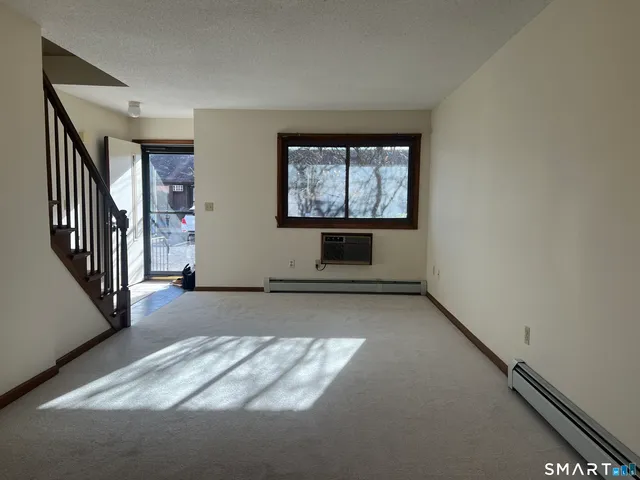 a en suite bathroom with a sink and a mirror