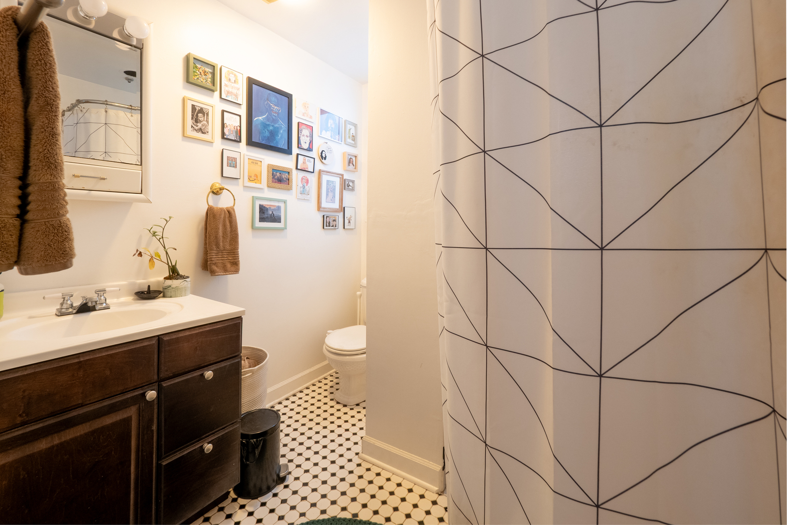 1920 West School Street Chicago, IL 60657 - Photo 12 of 36 a bathroom with a sink toilet and shower