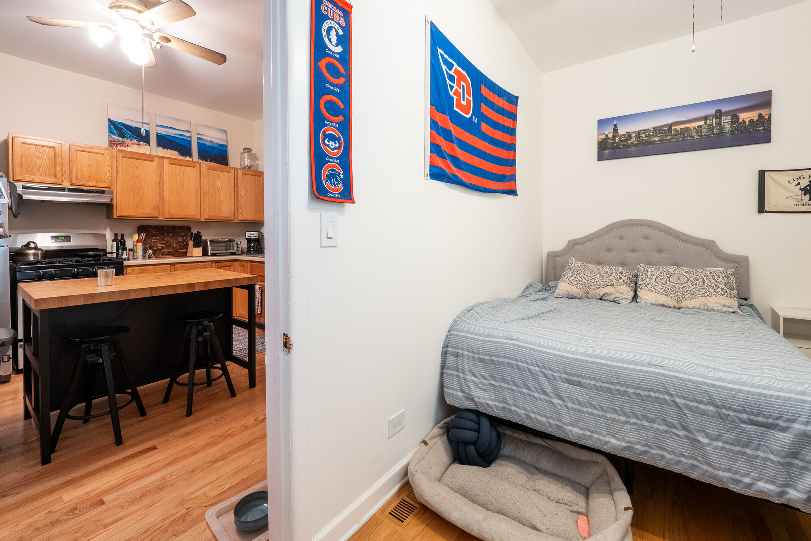 1920 West School Street Chicago, IL 60657 - Photo 14 of 36 a bedroom with a bed and a workspace