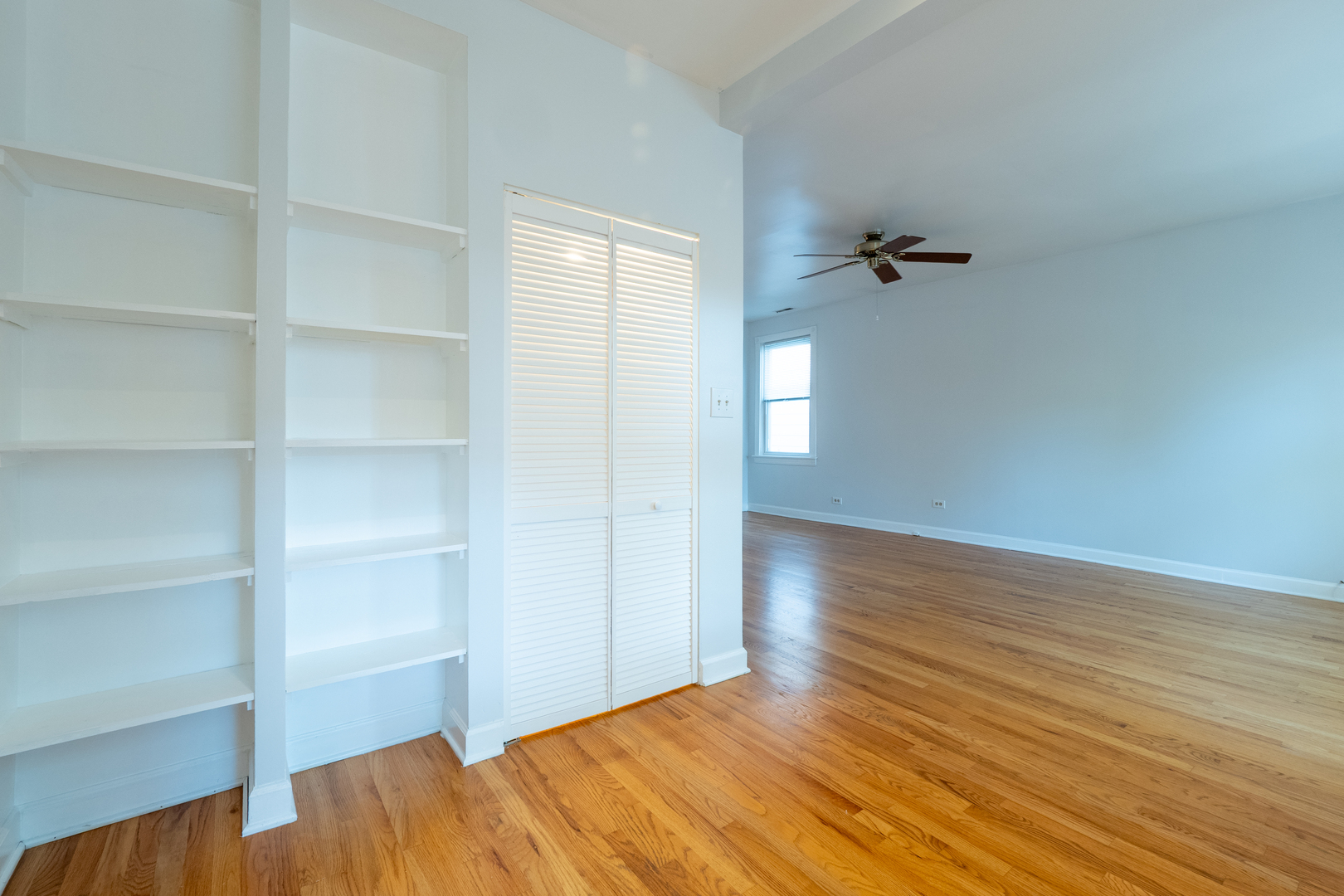 1920 West School Street Chicago, IL 60657 - Photo 19 of 36 a view of empty room with wooden floor