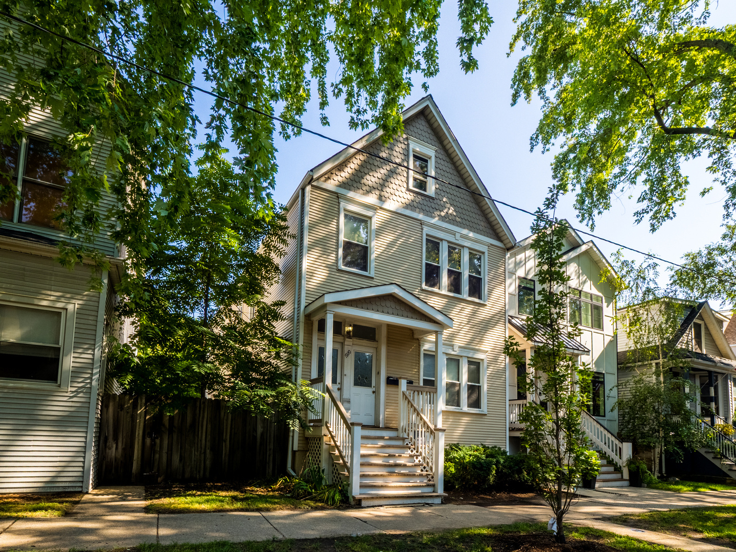 1920 West School Street Chicago, IL 60657 - Photo 2 of 36 a view of a brick house with a yard