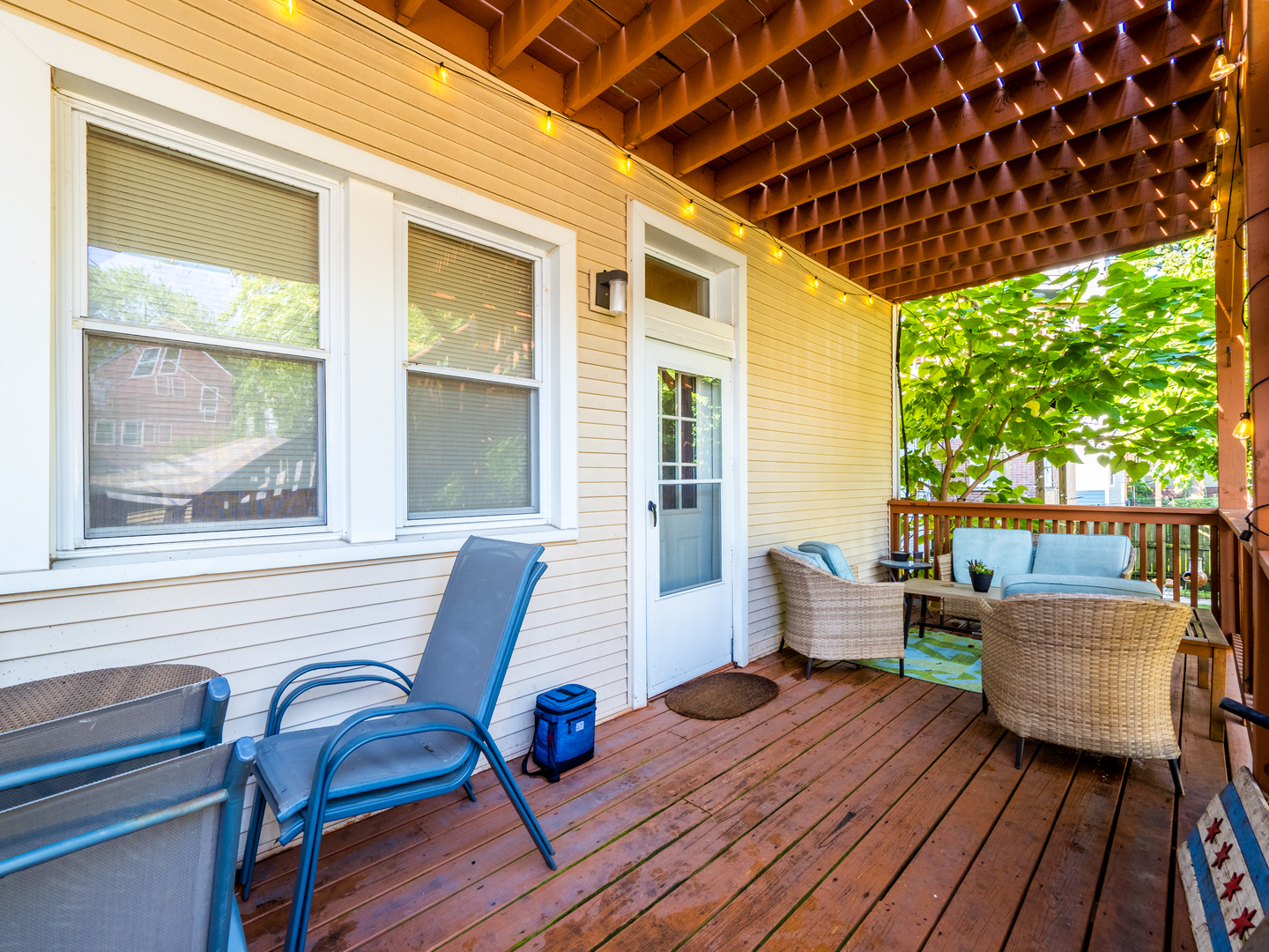 1920 West School Street Chicago, IL 60657 - Photo 35 of 36 a outdoor living space with furniture and wooden floor