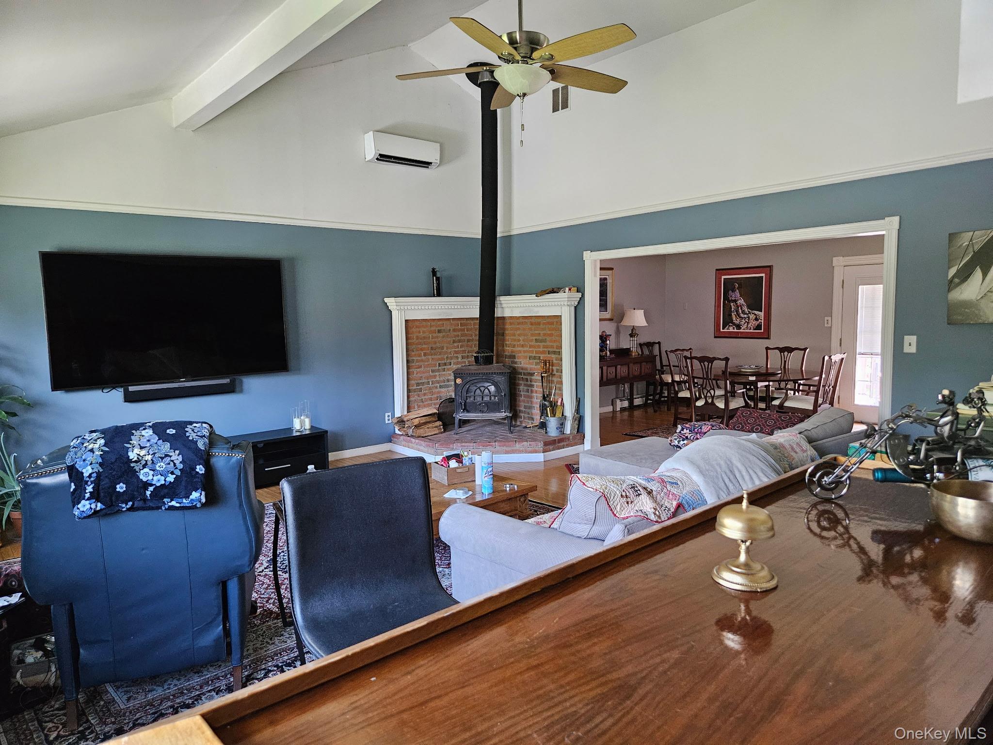 25 Lenape Road Newburgh, NY 12550 - Photo 14 of 35 a living room with furniture and a flat screen tv
