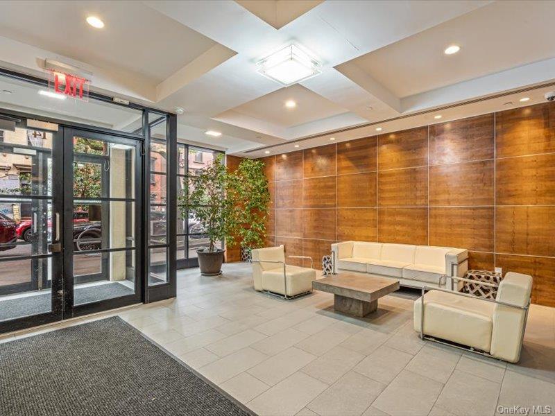 14 Hope Street, Unit 3F Brooklyn, NY 11211 - Photo 16 of 18 a lobby with furniture and ceiling fan