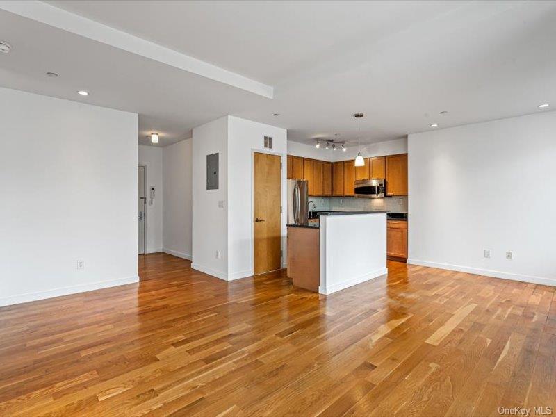 14 Hope Street, Unit 3F Brooklyn, NY 11211 - Photo 4 of 18 a view of a kitchen with wooden floor