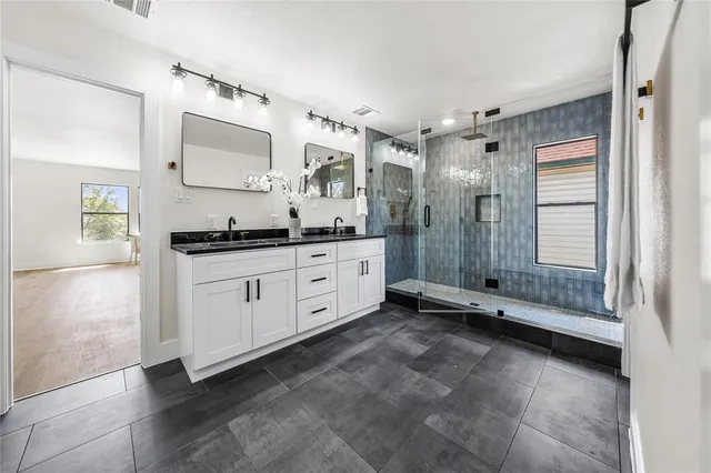 an entryway and livingroom with fireplace