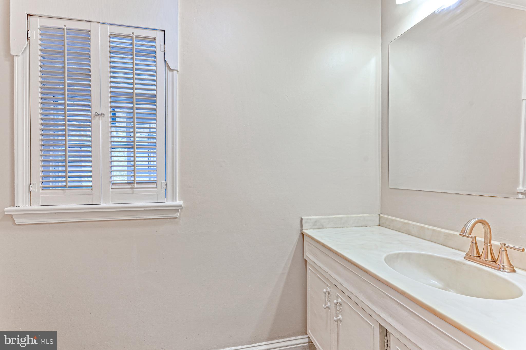 543 Hempstead Road Springfield, PA 19064 - Photo 26 of 31 First floor center hall bathroom