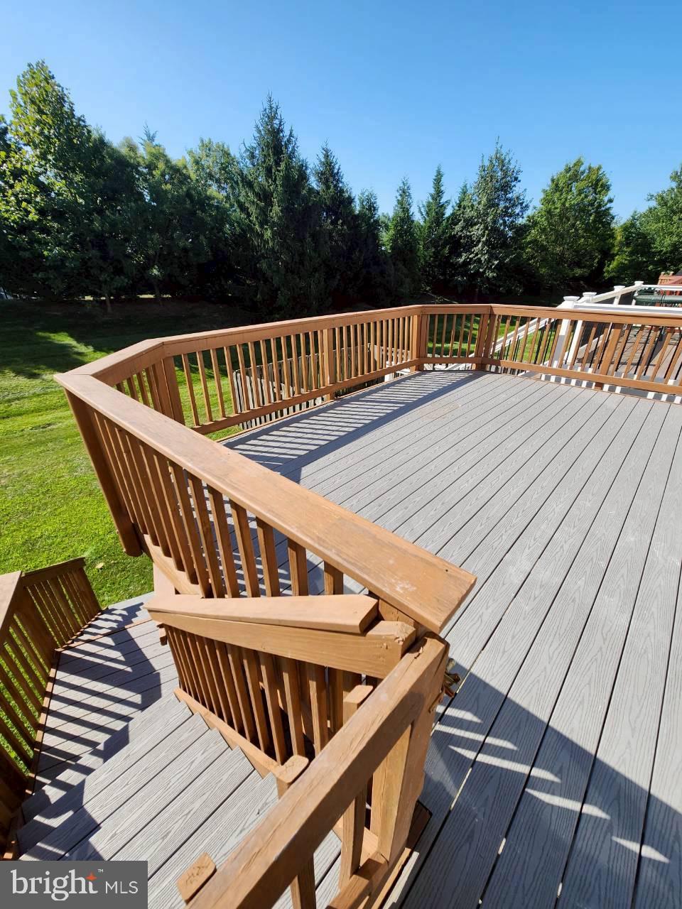 5992 Autumn Spell Elkridge, MD 21075 - Photo 27 of 30 a view of a roof deck with couches chairs and wooden floor