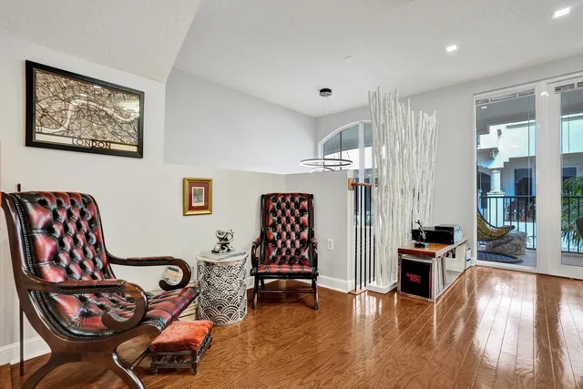 a living room with furniture and a window