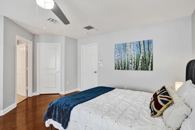 a bathroom with a sink a light fixture and a mirror