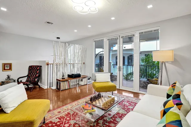 a living room with furniture and a table