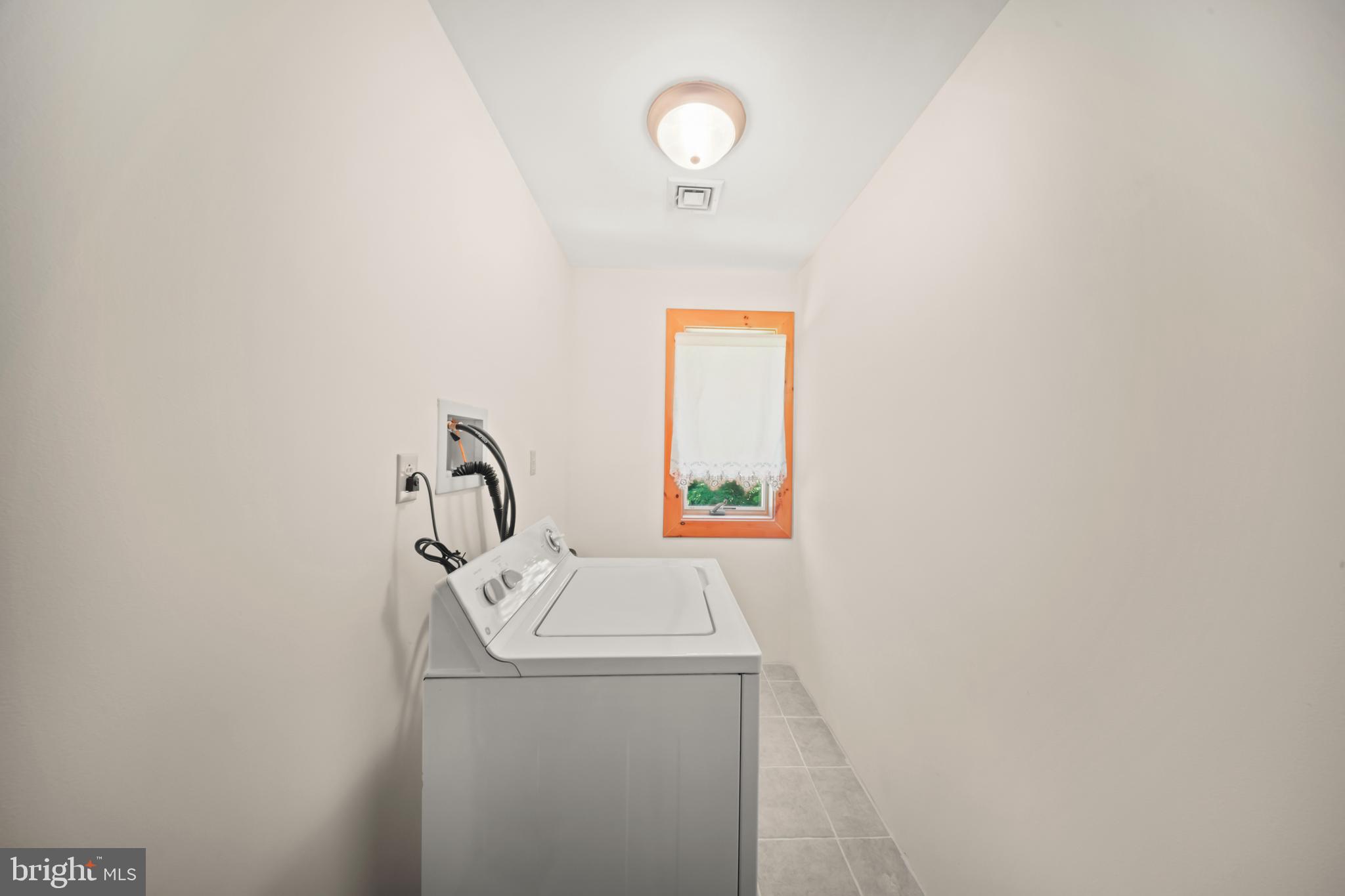 1473 North River Road Yardley, PA 19067 - Photo 38 of 42 a utility room with dryer and washer