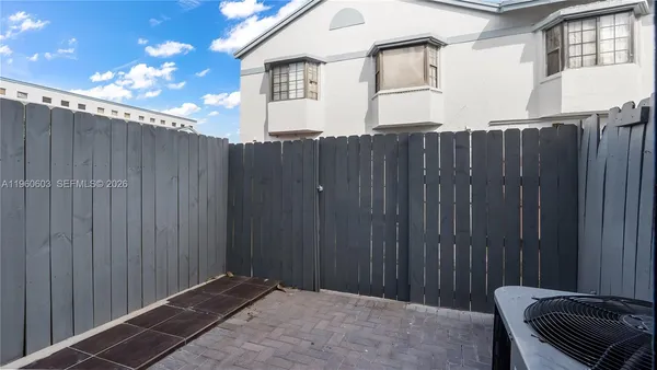 a view of a wooden fence