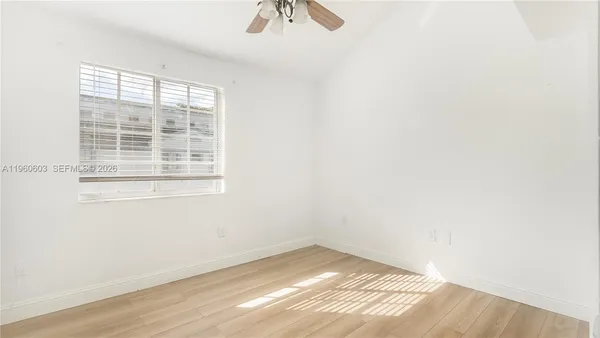 an empty room with a window