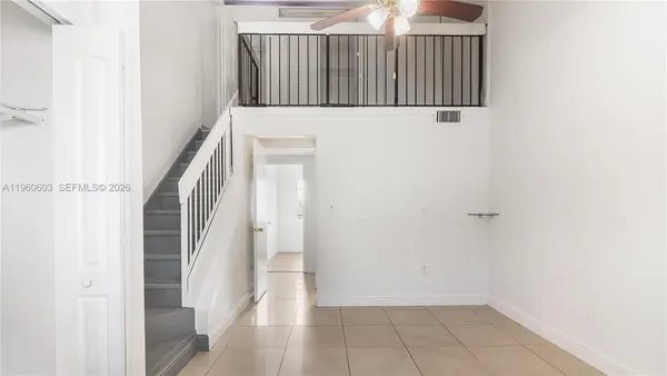 a view of a hallway with entryway
