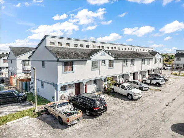 a car parked in front of a house