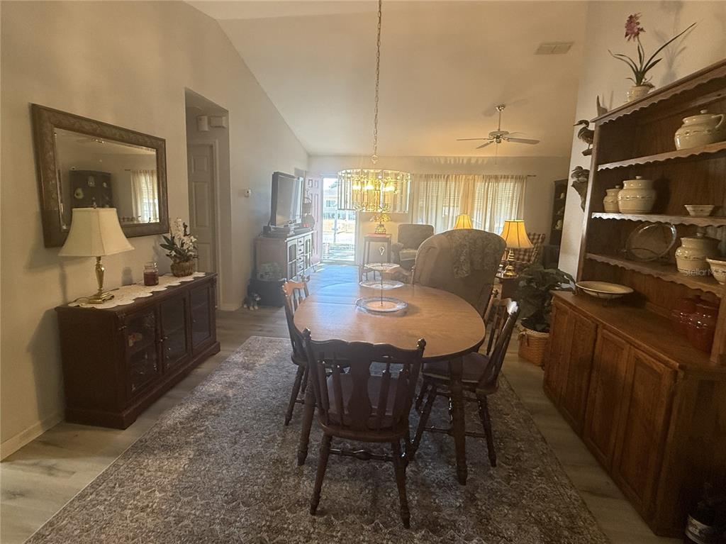 11263 Southwest 138th Lane Dunnellon, FL 34432 - Photo 11 of 25 a view of a dining room with furniture