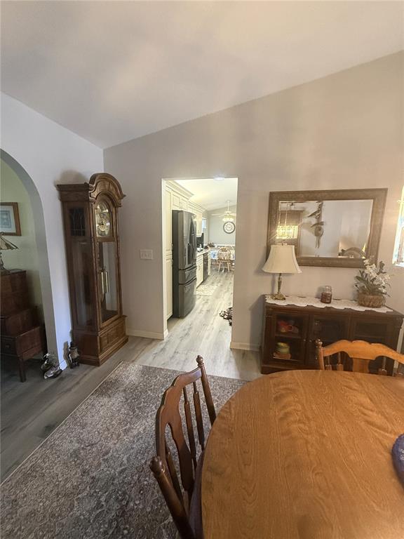 11263 Southwest 138th Lane Dunnellon, FL 34432 - Photo 17 of 25 a bedroom with bed and mirror