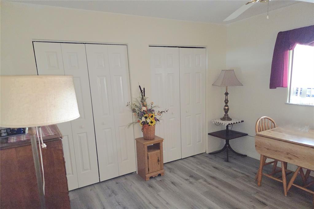 11263 Southwest 138th Lane Dunnellon, FL 34432 - Photo 19 of 25 a view of a workspace with furniture and wooden floor