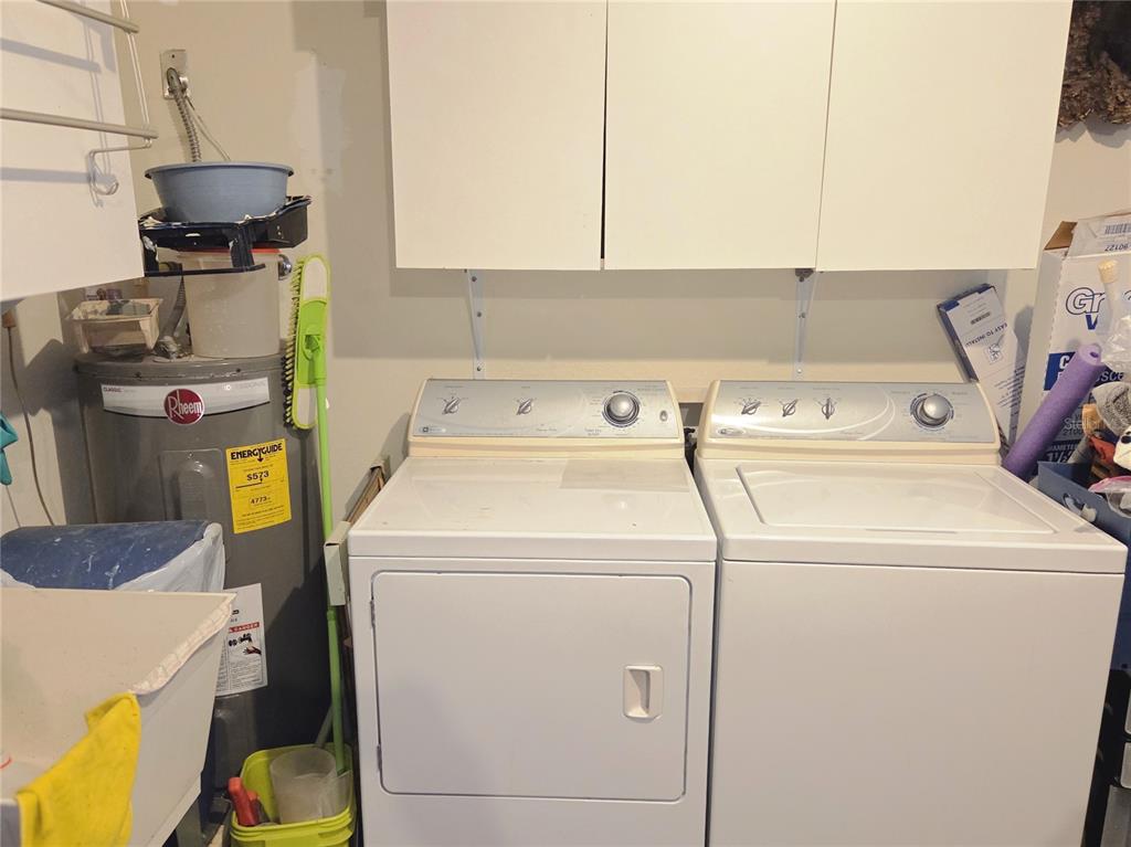 11263 Southwest 138th Lane Dunnellon, FL 34432 - Photo 22 of 25 a utility room with dryer and washer
