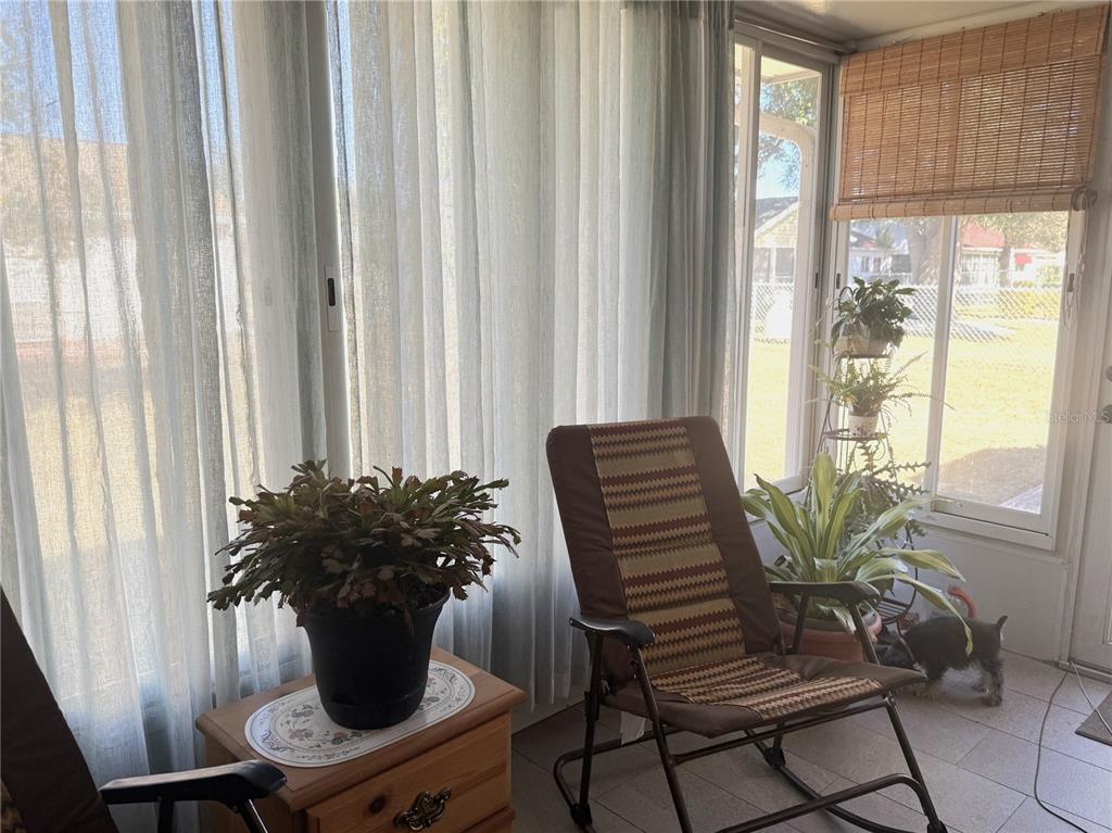 11263 Southwest 138th Lane Dunnellon, FL 34432 - Photo 24 of 25 a view of a dining room with furniture window and outside view