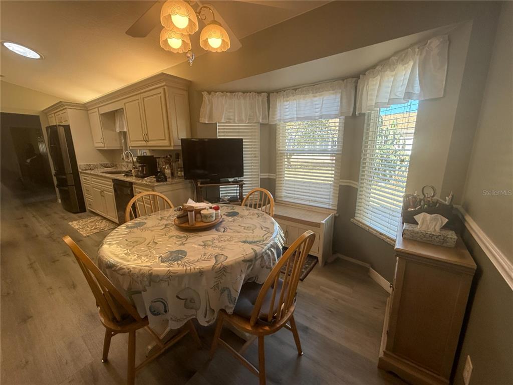 11263 Southwest 138th Lane Dunnellon, FL 34432 - Photo 8 of 25 a view of a dining room with furniture