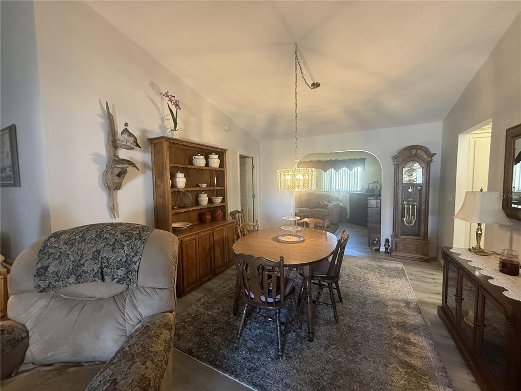 11263 Southwest 138th Lane Dunnellon, FL 34432 - Photo 9 of 25 a view of a dining room with furniture